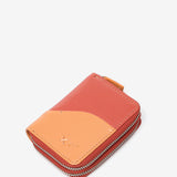 Small leather wallet in coral tones