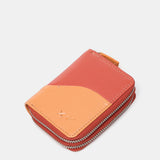 Cartera pequeña en piel en tonos coral