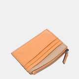 Tarjetero en piel naranja
