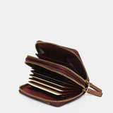 Cartera pequeña en piel bicolor burdeos