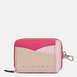 Tarjetero en piel fucsia