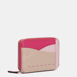 Tarjetero en piel fucsia