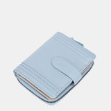 Cartera pequeña de piel azul claro