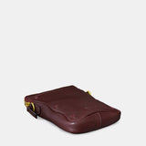 Handytasche aus braunem Leder.