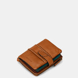 Piccola borsa da donna in pelle color cognac.