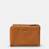 Piccola borsa da donna in pelle color cognac.