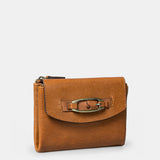 Piccola borsa da donna in pelle color cognac.