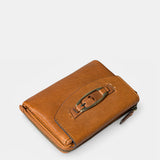 Piccola borsa da donna in pelle color cognac.