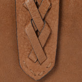 Piccola borsa da donna in pelle color cognac.