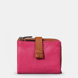 Piccola borsa da donna in pelle fucsia.