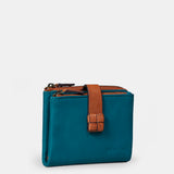Piccola pochette da donna in pelle blu.