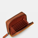 Piccola borsa da donna in pelle gialla.