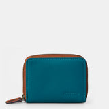 Piccola borsa da donna in pelle blu.