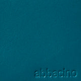 Piccola borsa da donna in pelle blu.