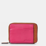 Porta carte da donna in pelle fucsia.
