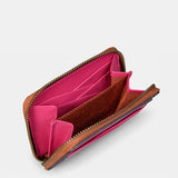 Porta carte da donna in pelle fucsia.