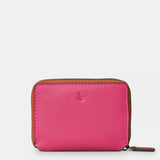 Porta carte da donna in pelle fucsia.