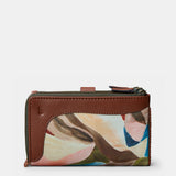 Cartera mediana de mujer en piel estampada