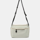 Bandolera de mujer en tejidos reciclados verde