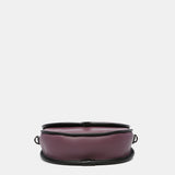 Borsa a tracolla viola a mezzaluna realizzata con materiali riciclati