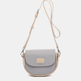 Bandolera pequeña en materiales reciclados en azul