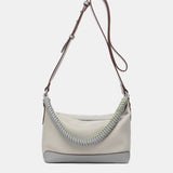 Bandolera en materiales reciclados en gris