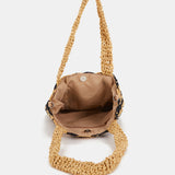 Black and beige striped braided handbag