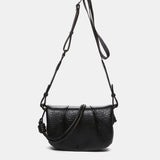 Black recycled material shoulder bag