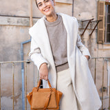 Small handbag in cognac recycled materials