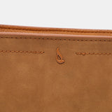 Shoulder bag in cognac recycled materials
