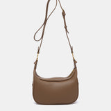 Bandolera con borla en materiales reciclados taupe