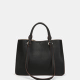 Bolso de mano troquelado en materiales reciclados negro