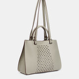 Bolso de mano troquelado en materiales reciclados verde