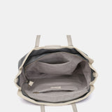 Shopper-Tasche aus grauem Recyclingmaterial.