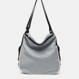 Bolso - mochila en materiales reciclados gris