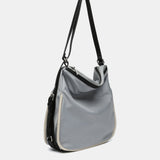 Bolso - mochila en materiales reciclados gris