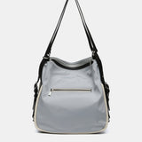 Bolso - mochila en materiales reciclados gris