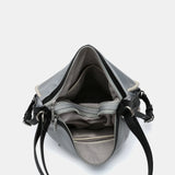 Bolso - mochila en materiales reciclados gris
