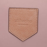 Bandolera en materiales reciclados rosa