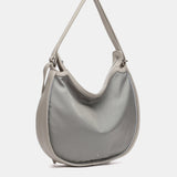 Bolso - mochila en materiales reciclados plata