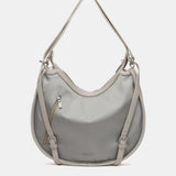 Bolso - mochila en materiales reciclados plata
