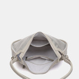 Bolso - mochila en materiales reciclados plata