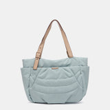 Borsa shopper realizzata con materiali riciclati e trapuntati in blu