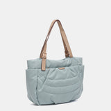 Borsa shopper realizzata con materiali riciclati e trapuntati in blu
