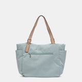 Borsa shopper realizzata con materiali riciclati e trapuntati in blu