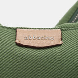 Bolso - mochila en materiales reciclados y acolchados verde