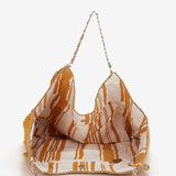 Bolso en fibras naturales en naranja