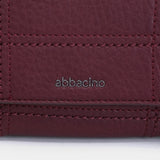 Piccola borsa a tracolla in materiali riciclati bordeaux