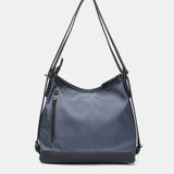 Bolso multifuncional en materiales reciclados gris