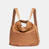 Multifunktionale Tasche aus cognacfarbenem Stoff